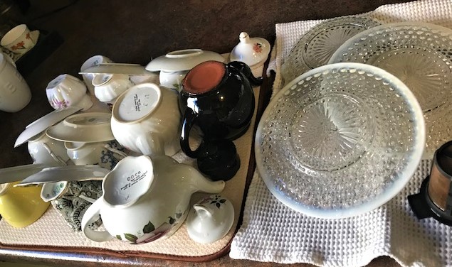 Tea Tasting plates and cups cleaned and ready to be put away