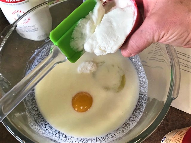 Measure Greek yogurt, buttermilk and egg in bowl coming to room temperature