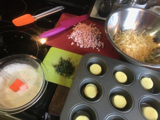 Ingredients lined up and ready to assemble for Cheesy Thyme and Ham Potato Gratin Stacks