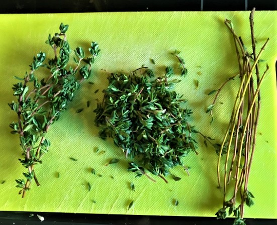 Fresh Thyme in 3 ways - sprigs, chopped and twigs.