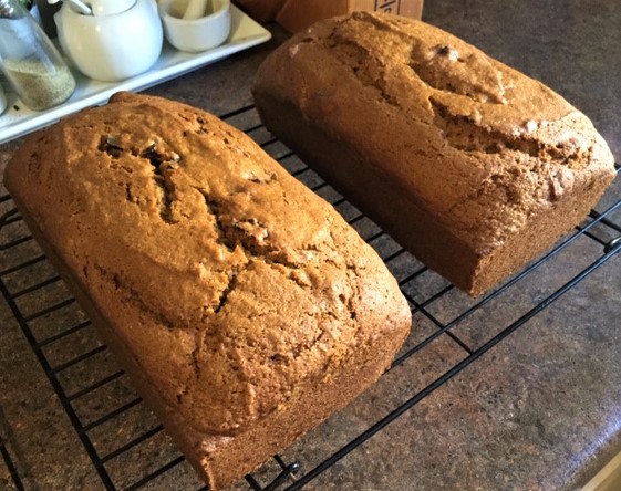 Whole Wheat Pumpkin Bread loaves cooling on rack.