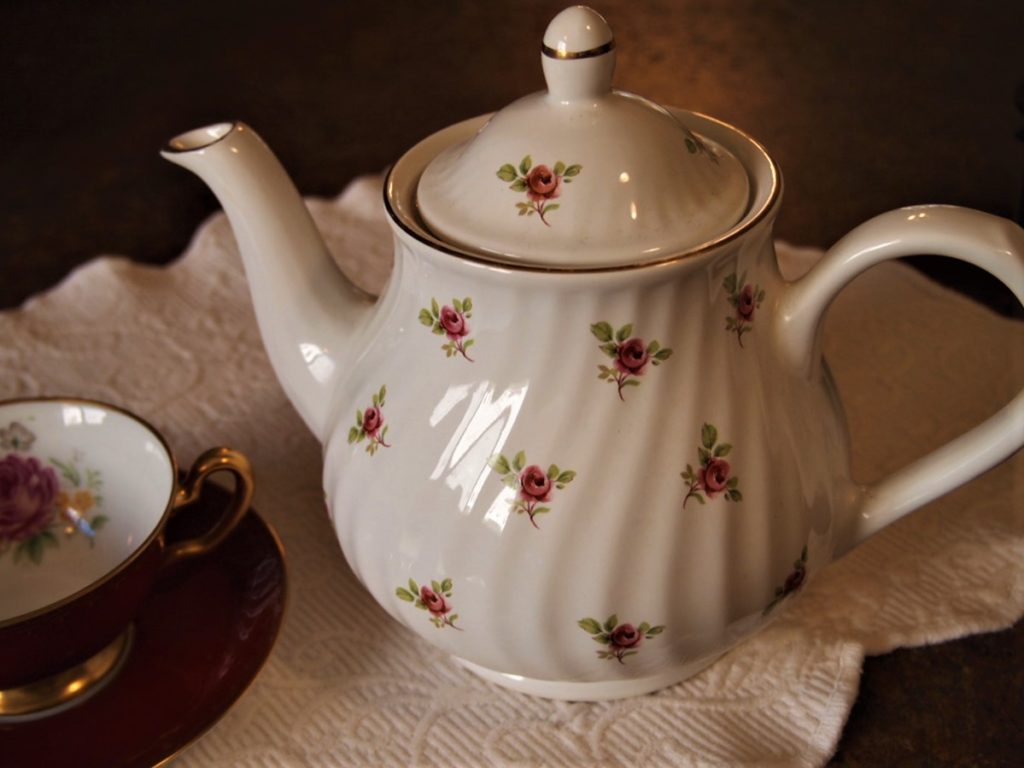 How to choose the best teapot - Arthur Wood floral teapot with cup ready to test the pour.
