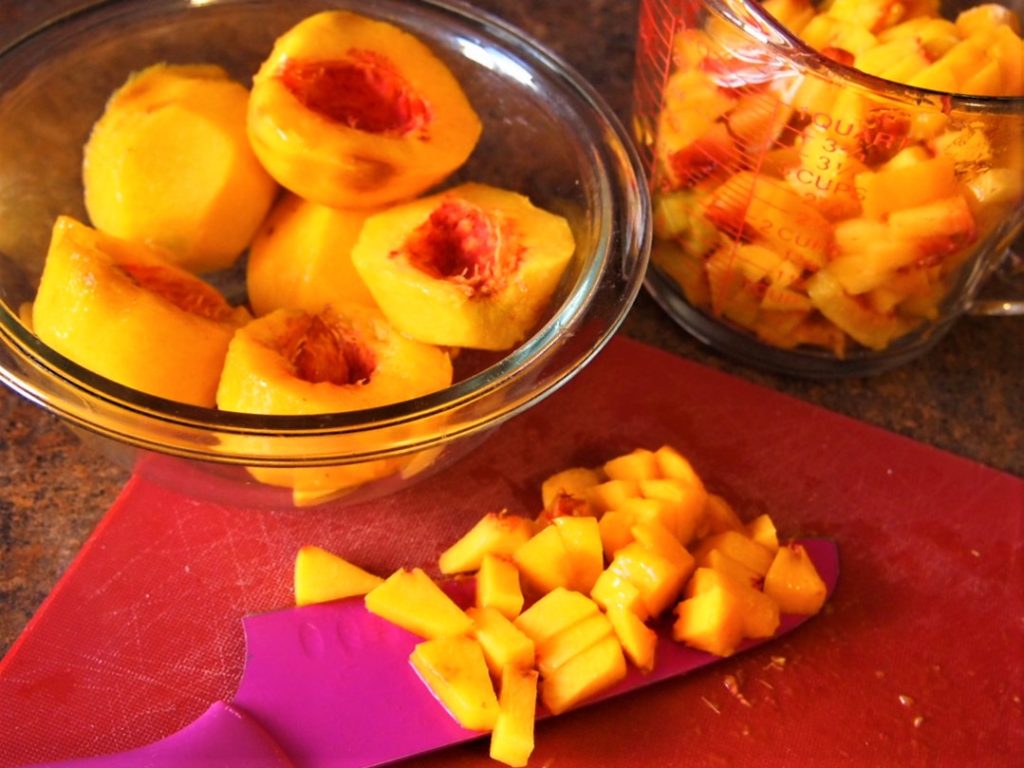 Fresh peaches, peeled and ready for baking. 