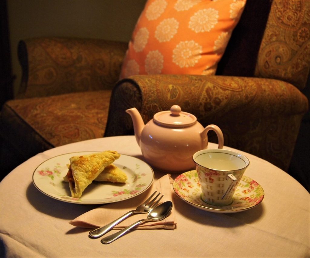 Enjoying Fresh Peach and Raspberry Turnovers with a cup of tea and my thinking chair.