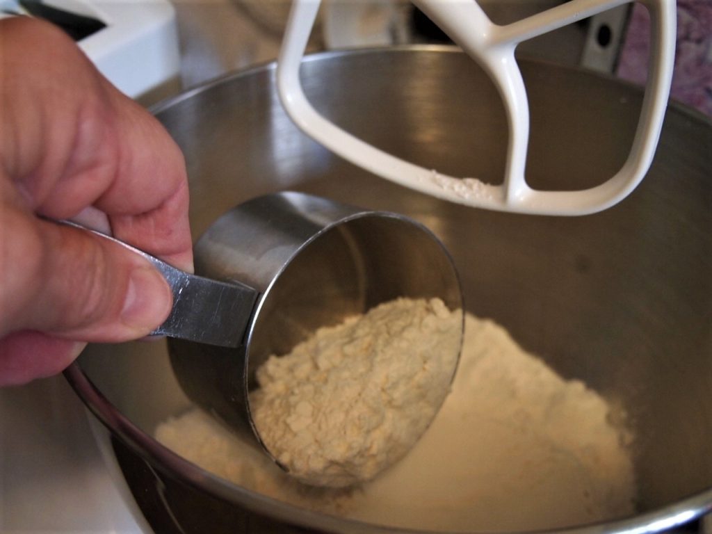 Adding flour to the Cake Mix Coffee Cake