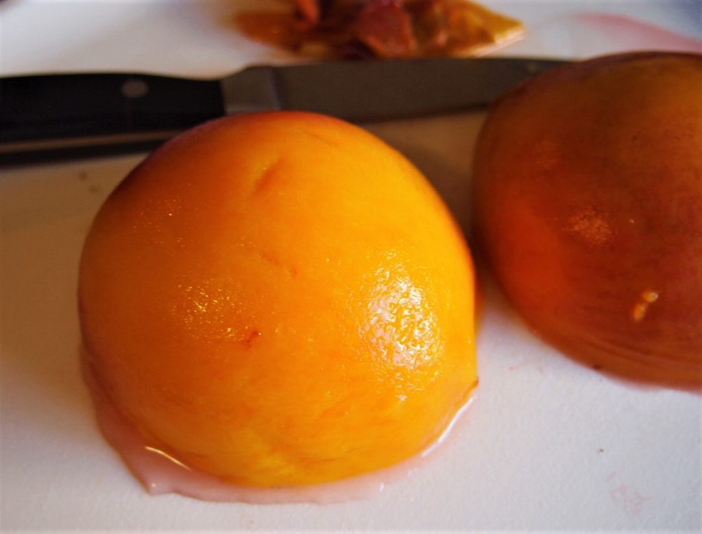 Poached peaches peeled and ready to be served for Peach Melba - Peaches Part 3