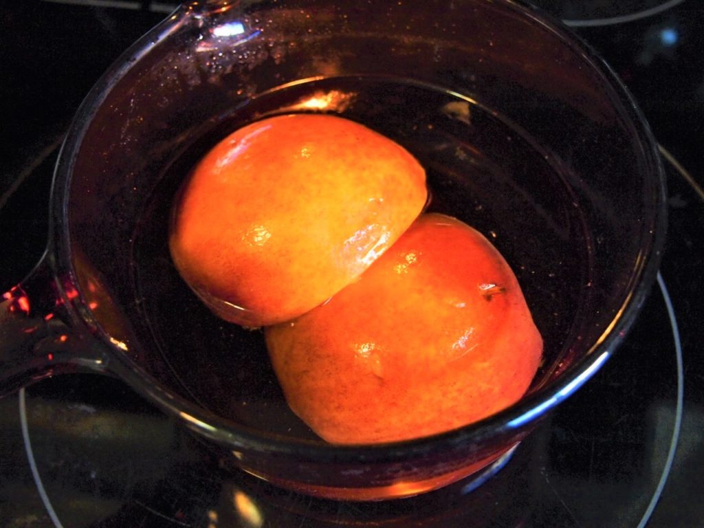 Poached peaches for Peach Melba